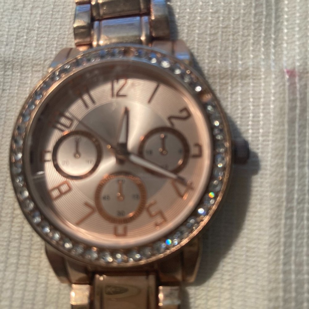 Woman's gold bracelet watch